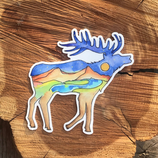 Mountain landscape under a night sky in an elk outline sticker