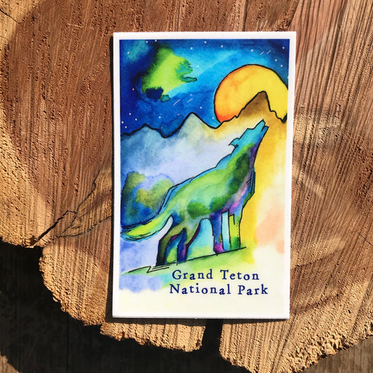 Wolf howling at moon sticker