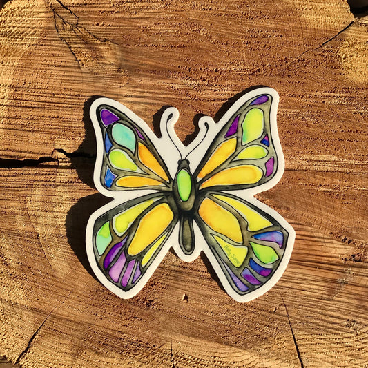 A butterfly sticker painted in the style of stained glass