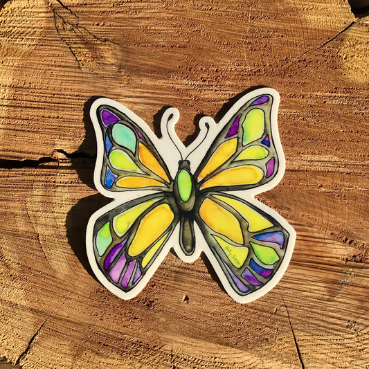 A butterfly sticker painted in the style of stained glass
