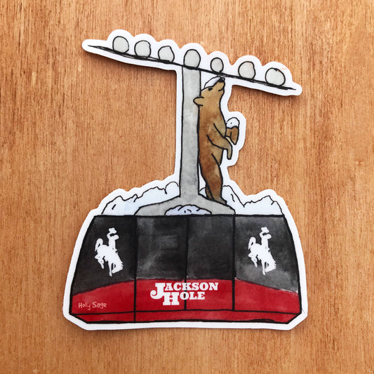 Bear riding the Jackson Hole Tram in winter sticker