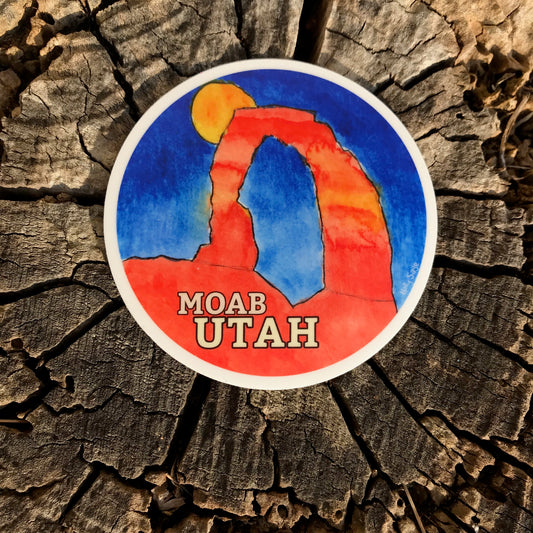 Moon rising over Delicate Arch and Moab, Utah sticker