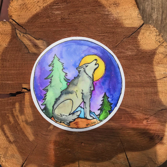 Wolf howling at the moon sticker