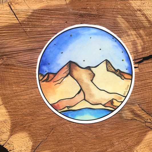 Mountain landscape under a blue sky sticker