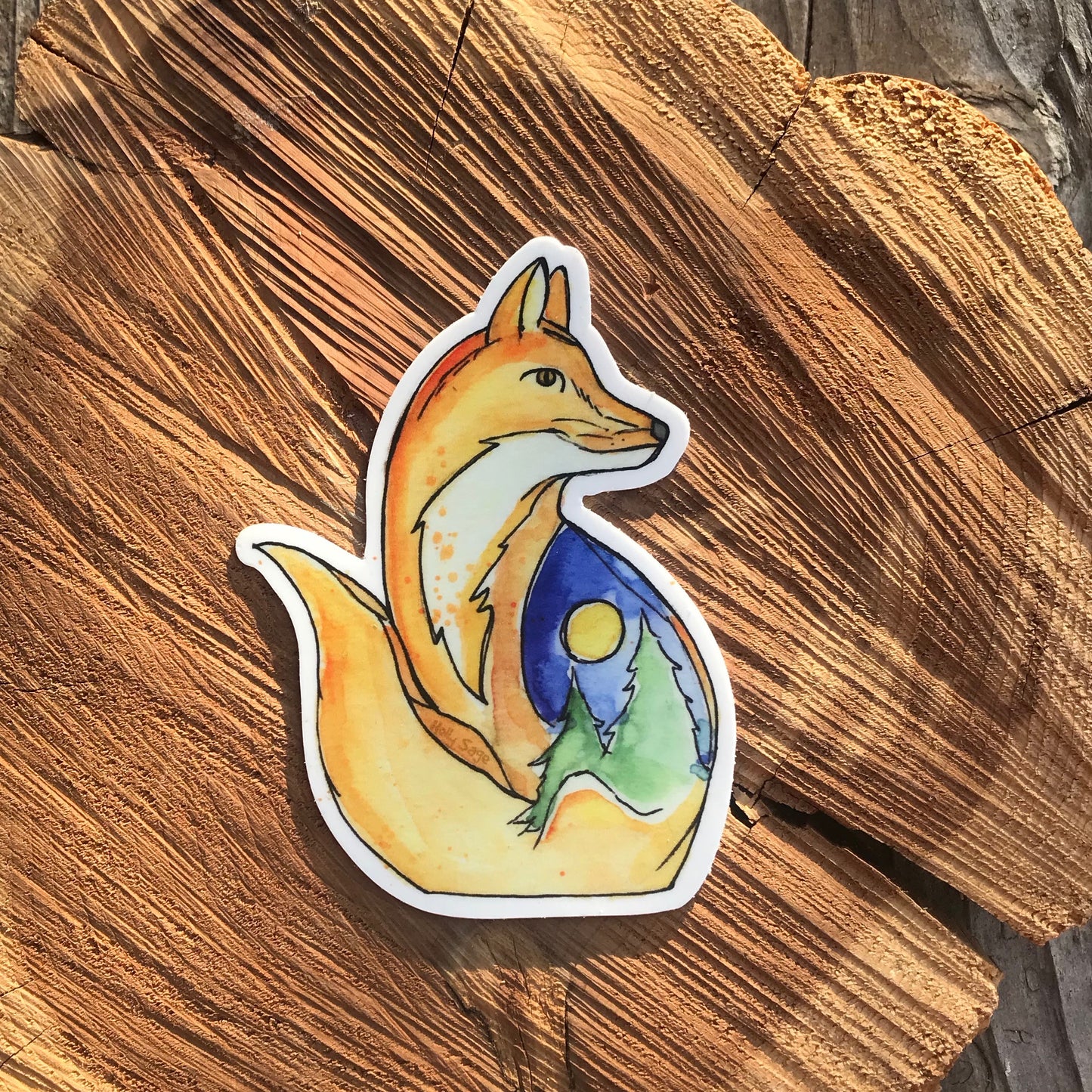Red fox sticker with nighttime landscape painted inside
