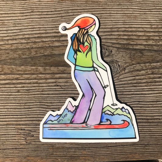 Girl skier sticker in the mountains
