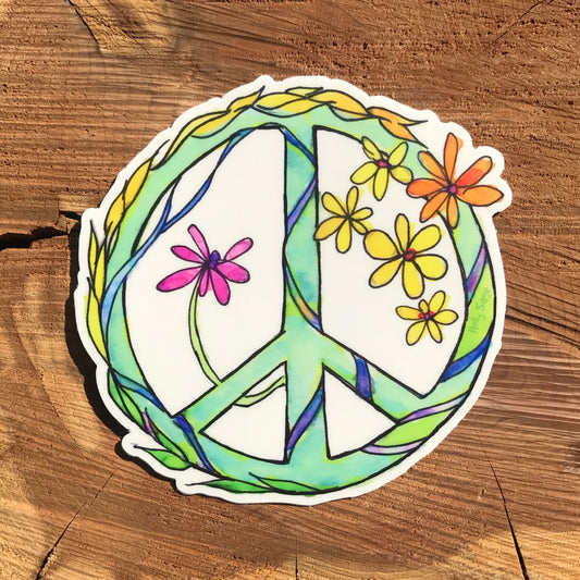 Peace sign sticker with flowers and decorations wrapped around it