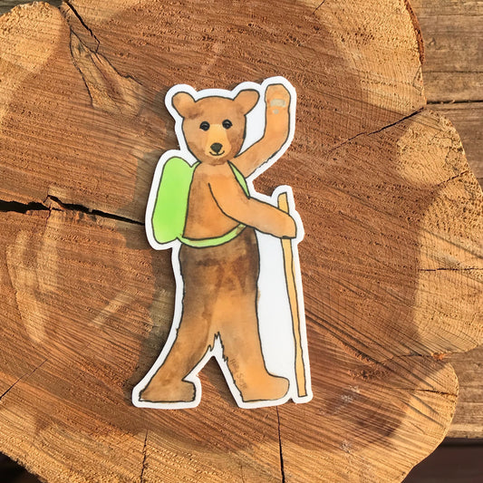 Bear on a hike sticker with walking stick and backpack
